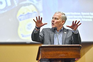 Arkansas Attorney General Tim Griffin speaks Thursday during a symposium titled Human Trafficking: Hear, Learn, Share at the West-Ark Church of Christ in Fort Smith. Visit rivervalleydemocratgazette.com/photo for today's photo gallery.

(River Valley Democrat-Gazette/Hank Layton)